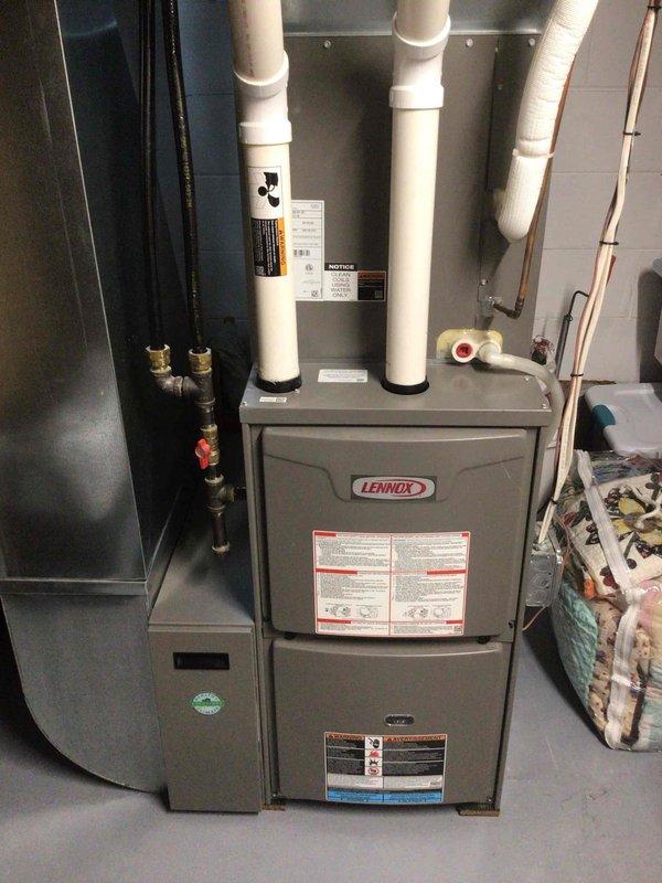 Completed comprehensive air conditioning tune-up on residential system including thorough washing of outdoor condenser unit and full electrical testing with all measurements reading within manufacturer specifications. Indoor furnace and outdoor condenser unit inspected, air filter found in good condition, and system confirmed operating properly with no issues detected.