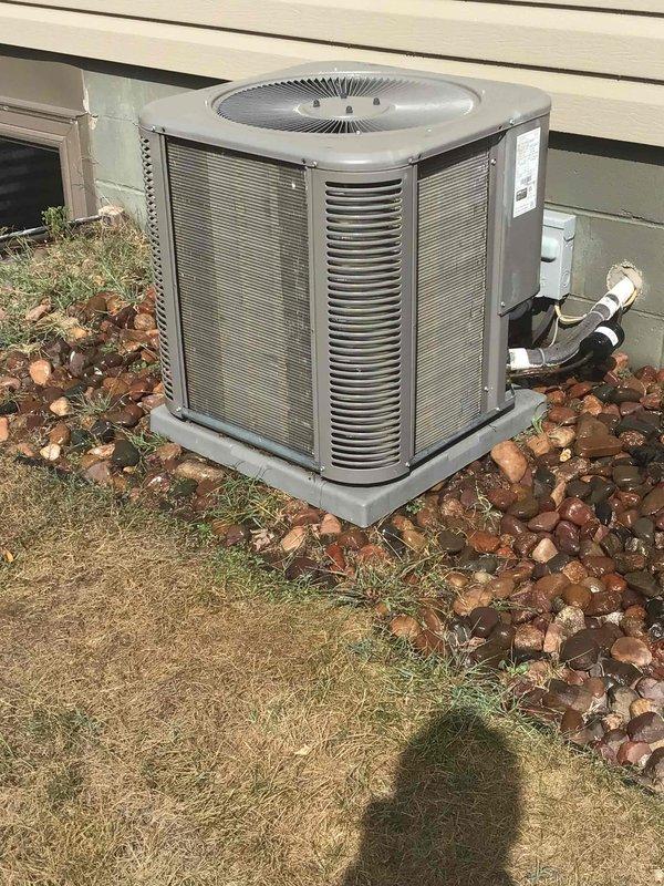 Completed comprehensive air conditioning tune-up on residential system including thorough washing of outdoor condenser unit and full electrical testing with all measurements reading within manufacturer specifications. Indoor furnace and outdoor condenser unit inspected, air filter found in good condition, and system confirmed operating properly with no issues detected.