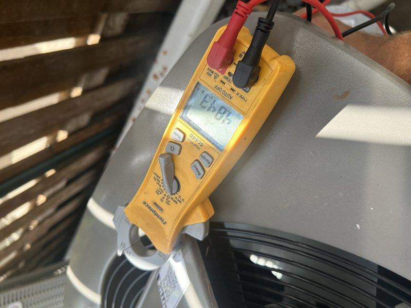 Completed annual air conditioning tune-up and preventative maintenance. Performed comprehensive system inspection including testing operational performance, verifying air filter condition, confirming condensate drain clearance, and cleaning condenser coil. Measured supply air temperature at 53.6°F and verified proper electrical voltage at 24.71V, confirming system is cooling efficiently and operating within manufacturer specifications.