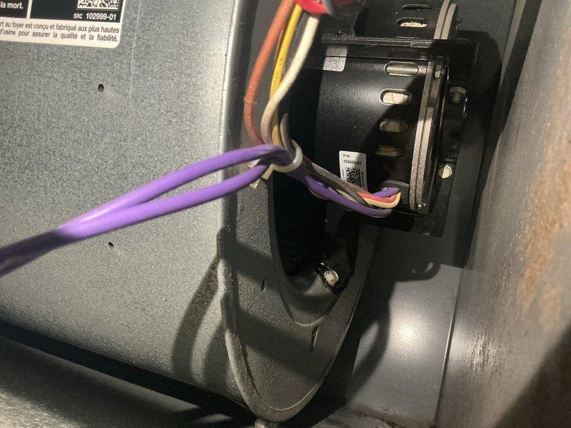 Responded to no cooling complaint on 15-year-old central air conditioning system. Upon inspection, diagnosed failed furnace control board with no voltage output to blower motor. Identified inducer draft motor leaking exhaust gases and condensation, creating potential safety hazard. Documented existing conditions with photos showing motor assembly and control board wiring configuration. Sourced replacement control board and scheduled return visit. Completed control board replacement and restored power to blower motor. Performed additional diagnostic testing to verify proper system operation following board replacement. System returned to normal cooling operation with all safety controls functioning properly.