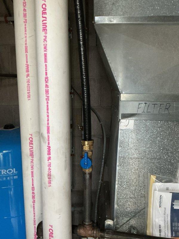 Responded to service call to inspect gas system and plumbing connections. Conducted thorough gas leak testing throughout the property with negative results. Identified and corrected exposed metal on gastite fitting to ensure proper installation standards. Re-tested all gas connections after repair to verify system integrity. In basement utility area, reconnected water supply pipes running beneath toe kick space that had become disconnected. All plumbing connections secured and tested for proper operation.