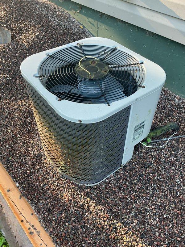 Responded to no cooling complaint on 21-year-old air conditioning system. Upon inspection, discovered deteriorated wiring to compressor contactor had failed, preventing compressor operation. Repaired damaged wiring and restored power to compressor. Verified system operation with amperage readings showing compressor drawing 28.92 amps, confirming proper electrical function. System restored to cooling operation.