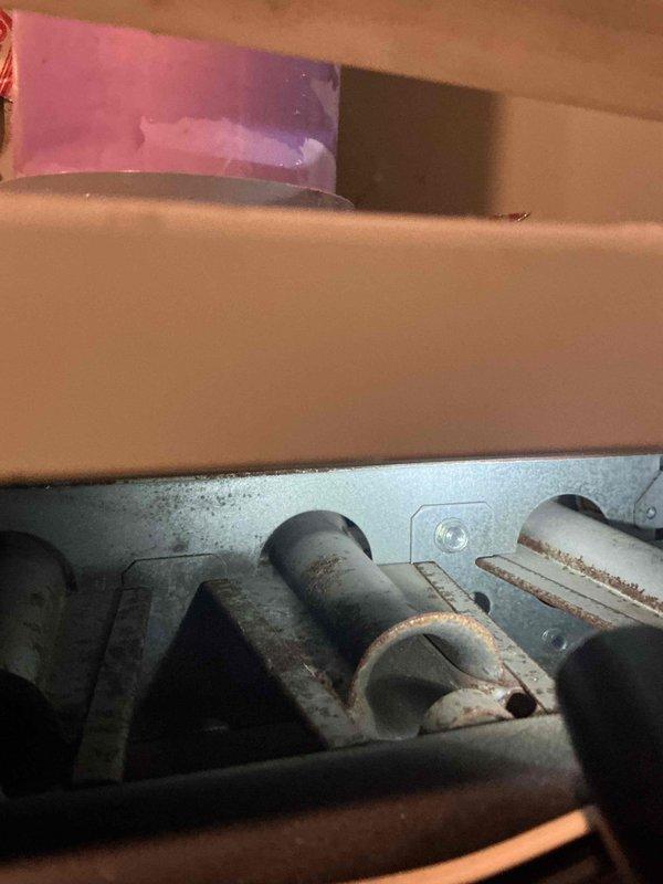 Completed annual heating and cooling maintenance visit on 16-year-old Trane furnace and AC system including one furnace and two gas fireplaces. Inspection revealed cracked heat exchanger with elevated temperature rise caused by excess oxygen entering the flame, confirmed by fluctuating O2 readings during combustion analysis. All other furnace components tested satisfactory including ignition system, flame safety controls, clean blower wheel, control board, clear condensate line, pressure switches, and replaced air filter. AC system inspection showed evaporator coil clean, capacitor and contactor in good condition, proper refrigerant charge, acceptable amp draws, and temperature drop within specification at 20 degrees. Performed safety shutdown due to cracked heat exchanger, documented findings with photos, completed parts form for Trane heat exchanger replacement estimate, reviewed all available options with homeowner, and scheduled follow-up with service advisor.