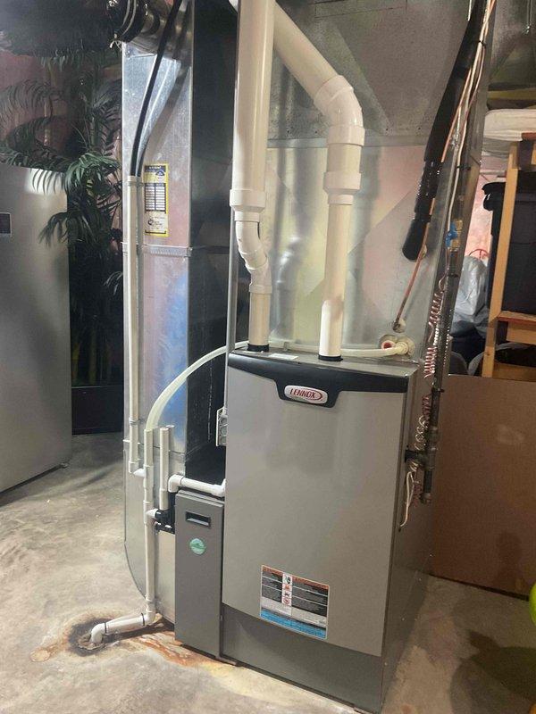 Completed scheduled 8-12 point air conditioning tune-up on a 2-year-old Lennox HVAC system under the FRP maintenance agreement. Performed comprehensive inspection of furnace, air handler, and associated components including ductwork, PVC venting, and electrical connections. All systems operating within manufacturer specifications with no deficiencies identified.
