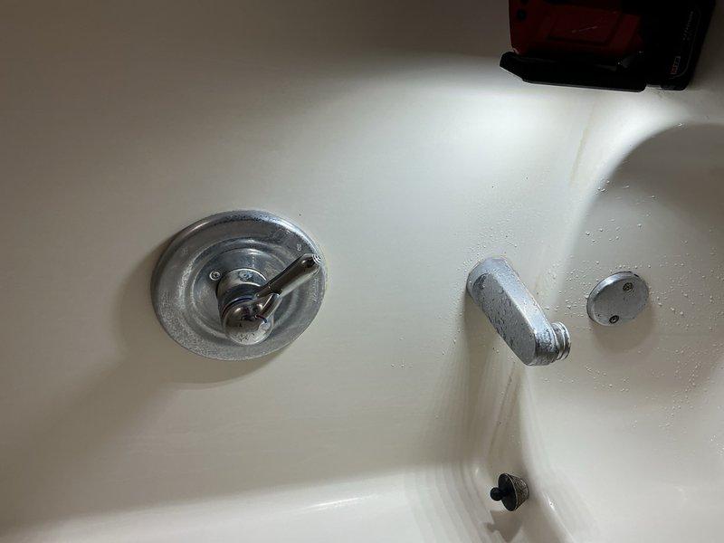 Responded to service call for leaking bathroom faucet and tub spout. Successfully replaced worn cartridge and gaskets in the shower valve control to eliminate leak. Both fixtures are now functioning properly with no water leakage detected upon completion of repairs.