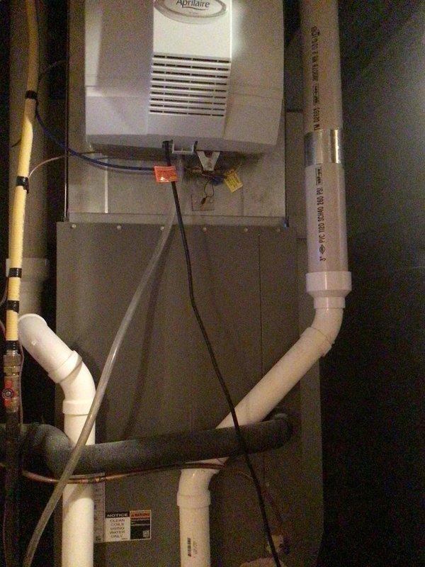 Completed comprehensive seasonal maintenance on multi-zone HVAC system including heating, cooling, and humidity control components. Performed tune-up on Trane outdoor condensing unit with coil cleaning, replaced Aprilaire humidifier pad, and cleaned dehumidifier filters on all zones. All equipment tested and verified operational within manufacturer specifications.