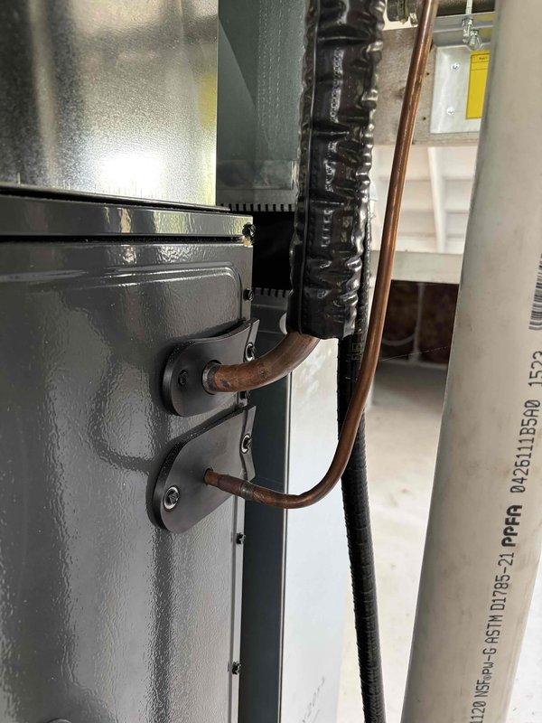 Performed gas line pressure test in preparation for inspector arrival. Arrived early per request due to inspector's history of early arrivals. Set up pressure gauge on gas piping system and initiated pressure test. Met with inspector on-site and maintained test pressure throughout inspection process. Test equipment left in place with gauge monitoring system pressure for inspector verification. Installation to be completed by install team upon inspector approval and test conclusion.