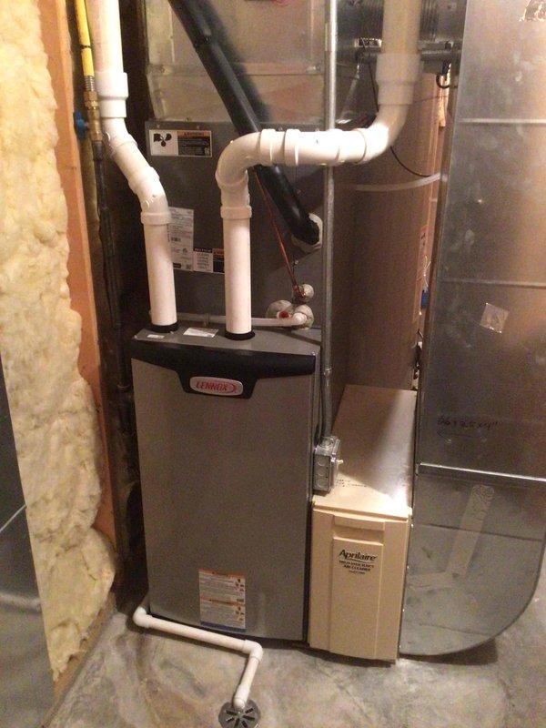 Completed comprehensive annual maintenance on both Lennox furnace and air conditioning system, both approximately one year old. Performed complete tune-up including washing outdoor condenser unit, testing all electrical components and connections at both indoor and outdoor units with all readings within manufacturer specifications. Verified proper system operation, confirmed air filter in excellent condition, and ensured all equipment functioning optimally.