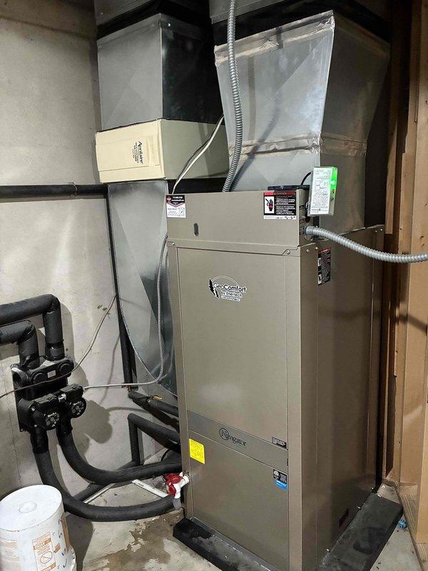 Responded to no-cooling call on Geo Comfort geothermal system. Upon arrival, found unit locked out on low pressure error. Reset system after homeowner had removed filter that had been pulled against evaporator coil. Unit ran successfully for approximately 20 minutes before shutting down on condensate error. 

Investigated condensate drainage system and discovered pan filling without draining. Cut apart and cleared condensate line which was completely obstructed with debris buildup. Inspected evaporator coil and found partial blockage. Brushed and flushed coil thoroughly to restore proper airflow and drainage. System restored to operational cooling status.

Also inspected hydronic heating system per customer request regarding overheating and zone control issues. Found multiple heating zones not shutting off properly. Upon examination, discovered evidence of recent thermostat work performed by homeowner with resulting wiring and control complications throughout multi-zone system. 

Exami