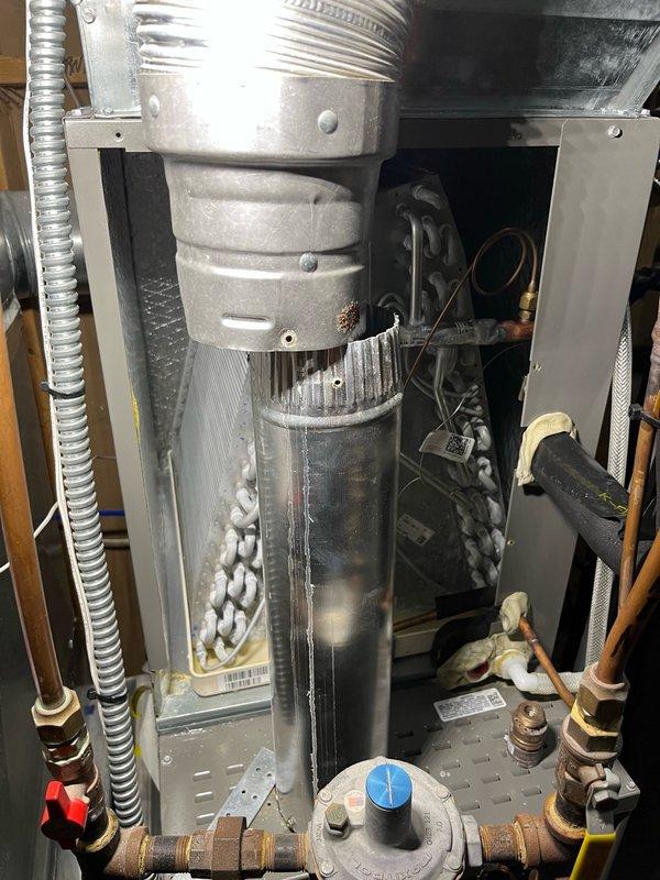Completed annual AC tune-up and maintenance under filter replacement program. Inspected indoor blower assembly and evaporator coil, finding both clean and operating properly with adequate drainage. Performed electrical inspection on outdoor unit with all readings within manufacturer specifications. Discovered heavily plugged outdoor condenser coil, performed thorough coil cleaning to restore proper airflow and heat transfer. Replaced air filter and verified system operation with 15-minute run test, confirming temperature split exceeded 20 degrees and all components functioning normally. Recommended monthly filter replacement schedule for optimal system performance.