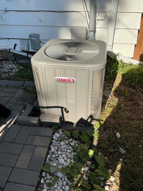 Performed comprehensive maintenance inspection on 18-year-old Carrier furnace and 7-year-old Lennox air conditioning system. Furnace evaluation revealed satisfactory ignition and flame safety operation, clean filter, functional control board and gas valve, but identified failed heat exchanger with elevated temperature rise, requiring safety shutdown of heating unit. Air conditioning inspection showed operational contactor, weak compressor capacitor, proper refrigerant charge, and acceptable 18-degree temperature drop; performed condenser coil rinse to maintain system efficiency. Reviewed all available options with homeowner and coordinated service advisor appointment to address furnace replacement needs.
