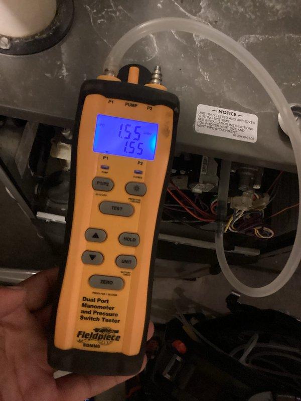 Completed comprehensive seasonal tune-up on gas furnace and air conditioning system under maintenance agreement. Performed thorough inspection evaluating system cleanliness, efficiency, and overall operational condition. Verified gas pressures using digital manometer, confirmed proper temperature splits across system, and inspected heat exchanger for cracks or deterioration—all components found to be in satisfactory condition. Examined air filter which showed moderate dirt accumulation consistent with normal usage. Noted minor rattling noise from A-coil atop furnace unit during initial inspection; noise dissipated and did not recur during operational testing. Conducted standard verification procedures to confirm furnace operational integrity and safe heating performance. System deemed ready for winter operation with no immediate repairs required. All safety controls, ignition components, and ventilation systems functioning within manufacturer specifications.
