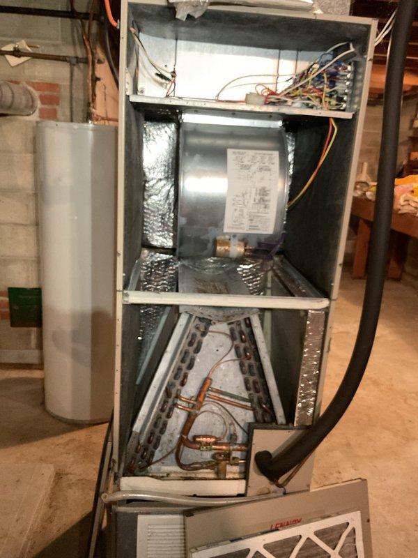 Performed scheduled A/C and furnace tune-up inspection. Air conditioning system inspected and found operating within normal parameters with evaporator coil and refrigerant lines functioning properly. During furnace inspection, discovered 30-year-old boiler with severely compromised burner assembly—burners completely plugged with soot despite being only two years old. Extensive soot accumulation found throughout boiler combustion chamber. Investigation revealed presence of mothballs stored in proximity to boiler, which when exposed to combustion can produce caustic byproducts leading to accelerated corrosion and burner deterioration. Evidence of rodent activity observed inside boiler unit with insulation damage noted. Due to unsafe operating condition, shut down gas supply and electrical power to boiler until unit can be properly cleaned with new burners installed or full boiler replacement completed. Documented conditions with photographs. Recommended scheduling appointment with adviso