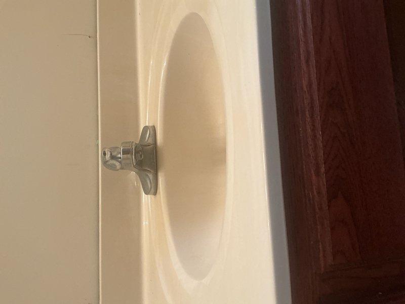 Responded to service call for stripped kitchen sink shut-off valve and pre-countertop replacement plumbing work. Replaced all deteriorated angle stops under kitchen and bathroom sinks due to seized valves that would not operate properly. Disconnected all sink plumbing in kitchen and bathrooms to facilitate countertop replacement scheduled for same day.