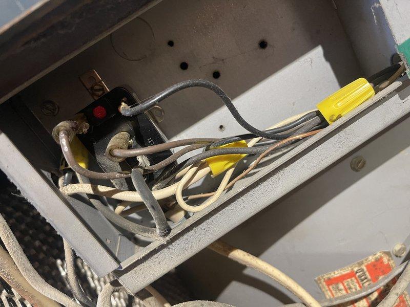 Completed comprehensive air conditioning tune-up on unit 10+x9481, including full system inspection per standard maintenance protocol. Inspected electrical connections and control panel wiring, noting aged wiring with dust accumulation but functional operation. Cleaned heavily soiled air filter with significant dust and debris buildup that was restricting airflow, restoring proper system ventilation and efficiency.