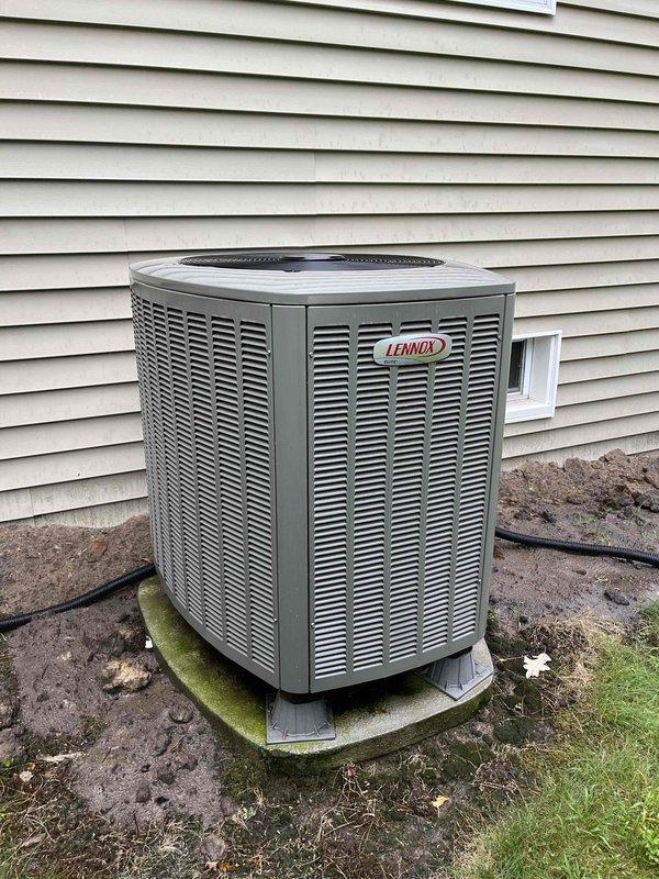Completed comprehensive maintenance tune-up on multi-zone heating and cooling system including furnace, central air conditioning, and wood boiler. Inspected boiler heat exchanger and burners, which showed excellent condition with minimal wear; verified all zone controls operational and confirmed proper combustion. Flushed evaporator drain line, inspected recently replaced air filter, verified evaporator pan cleanliness, and cleaned condenser coils on outdoor Lennox unit. Tested all electrical components with readings within manufacturer specifications. System startup confirmed proper AC operation with 20° temperature differential across coil. Inspected wood boiler door seal, actuator, and circulation pumps—all functioning correctly. All systems operating as designed with no deficiencies noted.
