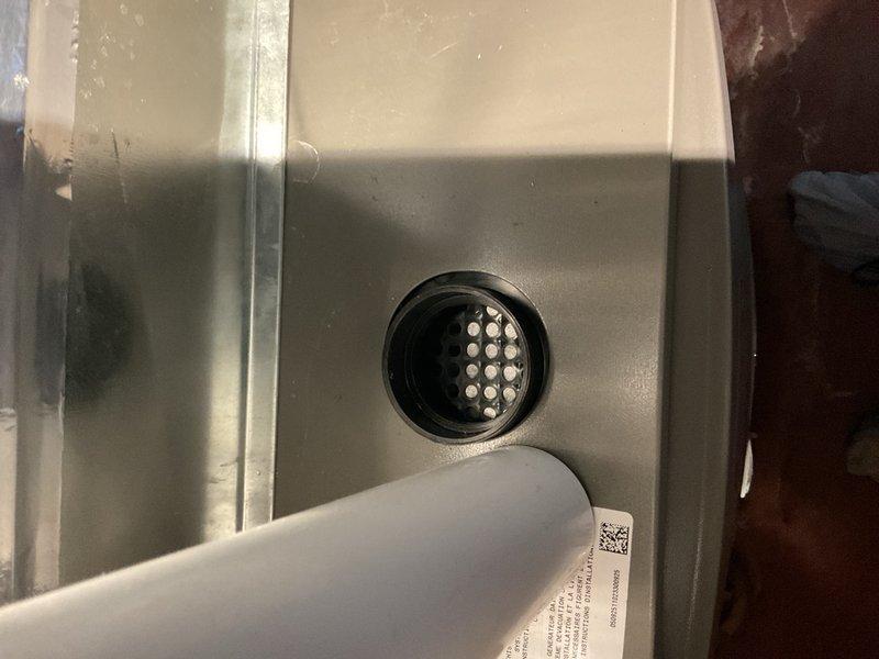 Performed scheduled maintenance visit on Lennox furnace and discovered water dripping from beneath the evaporator pan onto the floor around the condensate pump. Tested condensate pump with 20 oz of water; pump operated normally with proper discharge to wash basin, eliminating pump as source of water issue. 

Diagnosed water source as A/C evaporator coil, which was found partially frozen and causing condensate overflow at coil section. Connected diagnostic probes and obtained preliminary refrigeration readings on R-410A TXV system while coil remained partially iced. Measured suction pressure 103.6 psig, liquid pressure 232.8 psig, evaporator saturation temperature 33.1°F, condensing saturation temperature 78.9°F, suction line temperature 63.4°F, and liquid line temperature 79.0°F. 

Calculated superheat at 30.3°F and subcooling at 0.6°F, significantly below rated 10°F subcool target. Readings indicate starved evaporator condition and strongly suggest system is low on refrigerant charge.