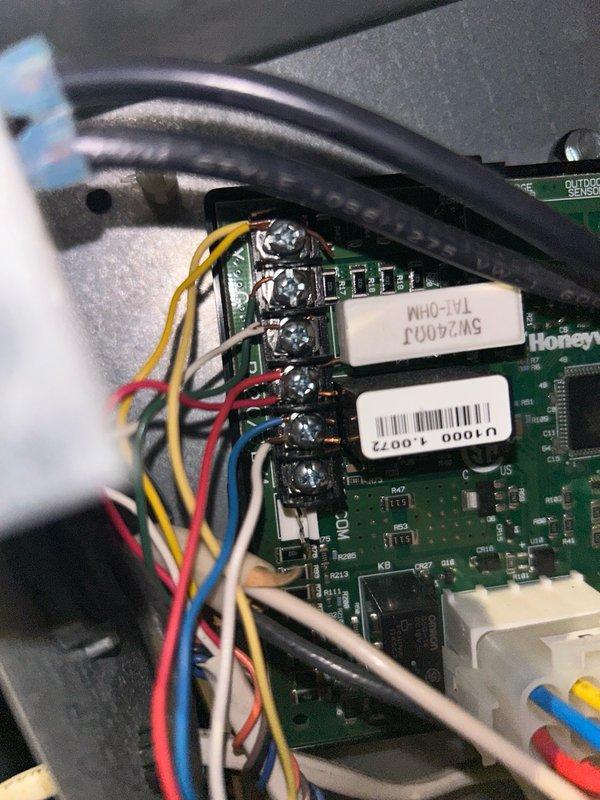 Responded to no cooling complaint on aging Lennox system where outdoor condenser unit was not operating while indoor blower ran normally. Diagnosed loss of low voltage control signal to condenser despite proper 240V supply at contactor. Removed and re-terminated all control wiring connections at circuit board to eliminate loose or corroded contacts, then reset system. After allowing system to stabilize, verified condenser operation, confirmed proper refrigerant charge and system performance. Unit returned to normal cooling operation with all connections secured.