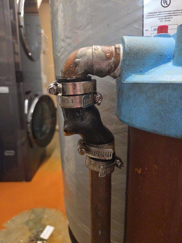Responded to emergency water line leak located near pressure tank in garage area. Upon arrival, identified burst water line requiring immediate replacement. Removed damaged section of water line and installed new piping with proper copper fittings and secure hose clamp connections. Verified system integrity, restored water pressure, and confirmed no additional leaks present upon completion.