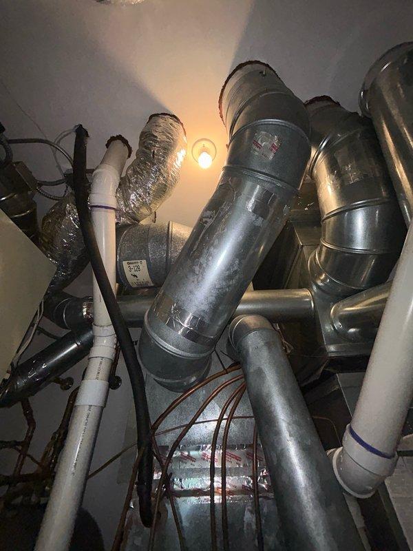 Completed comprehensive furnace tune-up inspection with all components operating within normal parameters. Verified thermostat operation, air filter condition, blower assembly, burner/heat exchanger compartment, inducer operation, ignition system, flame sensor, safety controls, electrical components, condensate drain, and temperature rise. Gas valve assembly and electrical connections inspected and found secure with no mechanical deficiencies or safety issues identified. Recommended regular filter maintenance to maintain optimal system performance.