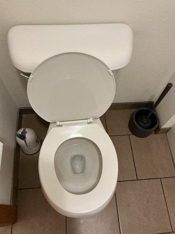 Responded to a clogged toilet in a residential bathroom. Upon inspection, determined the blockage was caused by an accumulation of toilet paper in the drain line. Successfully cleared the obstruction using a closet auger, restoring full drainage function within approximately ten seconds. Tested the toilet to verify proper flushing operation and confirmed complete resolution of the issue.