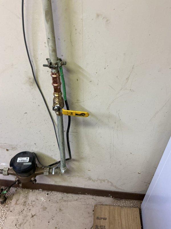 Coordinated with city water department to replace both deteriorated main shut-off valves serving the property. Removed existing failed valves and installed new brass shut-off valves on the main water supply line entering the structure. Work was completed during the city's scheduled service window to minimize water service interruption. All connections were properly sealed and tested for leaks, with new valves now providing reliable water control for the entire plumbing system.