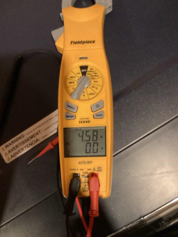 Completed annual maintenance tune-up on 9-year-old furnace and air conditioning system. Performed comprehensive safety, efficiency, and reliability assessment of both units.

**Furnace Service:**
Inspected furnace system located in basement. Verified satisfactory temperature splits across heat exchanger. Observed clean air filter in place but recommended switching to a less restrictive filter to optimize airflow and system efficiency. Measured gas pressure and found it elevated above manufacturer specifications. Adjusted gas valve pressure down to proper operating level of 3.5 inches water column to ensure safe and efficient combustion. Verified proper ignition sequence and burner operation.

**Air Conditioning Service:**
Inspected outdoor condenser unit and found coil to be clean with no debris accumulation. Discovered wasp nest inside electrical disconnect box and removed it to prevent potential electrical hazards and service interruptions. Checked refrigerant charge using manifold g