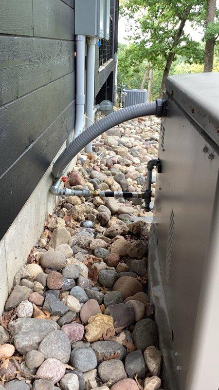 Upgraded existing gas line to 1" diameter to meet generator requirements. Removed and replaced gas line running to generator unit, ensuring proper sizing and code compliance. Straightened and resized flex connector for improved gas flow and safety. All connections tested and verified for proper operation.
