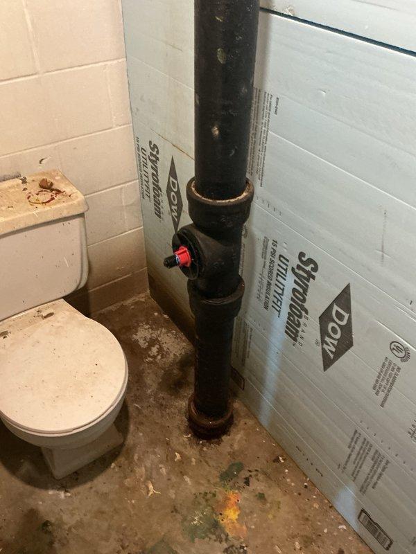 Responded to a main line sewer backup that caused flooding through the basement floor drain. Upon inspection, discovered root intrusion in the main drain line. Successfully cleared the blockage using a mechanical snake, then performed a camera inspection to verify the line was fully restored and assess the condition of the piping.