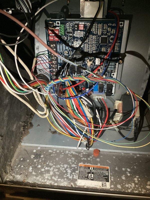 Performed comprehensive furnace tune-up and maintenance inspection at cemetery caretaker house. Conducted thorough system evaluation including inspection of heat exchanger for previously noted small hole, tested all electrical components and control board functionality, verified proper operation of relays and transformer connections, and replaced air filter. All furnace components found to be in good working condition with system heating properly and operating within normal parameters at time of service.