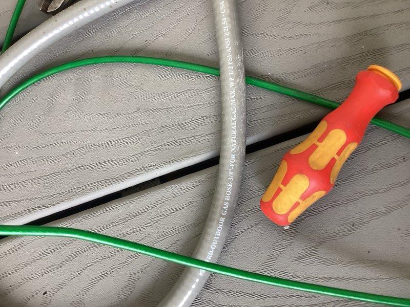 Responded to gas service call and determined no gas leak present. Upon inspection, identified incompatible quick-connect adapter preventing proper connection between grill gas whip and gas line on deck. Provided quote for replacing existing quick-connect fitting with compatible brass natural gas quick-disconnect kit to establish proper gas connection for outdoor grill appliance.