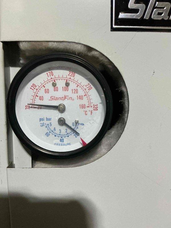 Responded to service call for hydronic heating system maintenance. Successfully bled and purged air from two radiators to restore proper heat distribution, then refilled the system to appropriate water level. Verified system pressure and temperature readings on boiler gauge were within normal operating parameters upon completion.