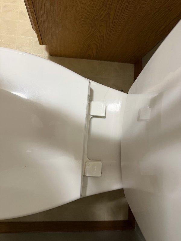 Responded to callback for continuously running toilet following recent fill valve installation. Upon inspection, identified that fill valve float stop point was set too high, causing float to catch on bowl fill tube and prevent proper shutoff. Adjusted float stop point to correct height, tested flush cycle five times to verify proper operation and consistent shutoff, and reinstalled toilet seat to complete service.