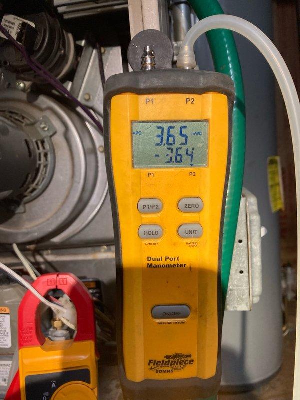Performed HVAC certification inspection on a 2004 Lennox 80% efficiency furnace. During heat exchanger examination, discovered water staining around an eye ring and identified a small crack in the middle burner section. Conducted combustion analysis testing which showed gas pressure at 3.62 w.c. and carbon monoxide levels at 40 ppm, both within acceptable parameters. Inspected flame sensor, igniter, blower motor, and inducer motor—all components found to be functioning properly. Noted air filter required replacement. Due to heat exchanger deterioration and burner crack presenting potential safety hazards, red-tagged the unit and shut off gas supply to the furnace per safety protocols. Contacted homeowner to explain critical findings and safety concerns; homeowner requested estimate for complete system replacement.