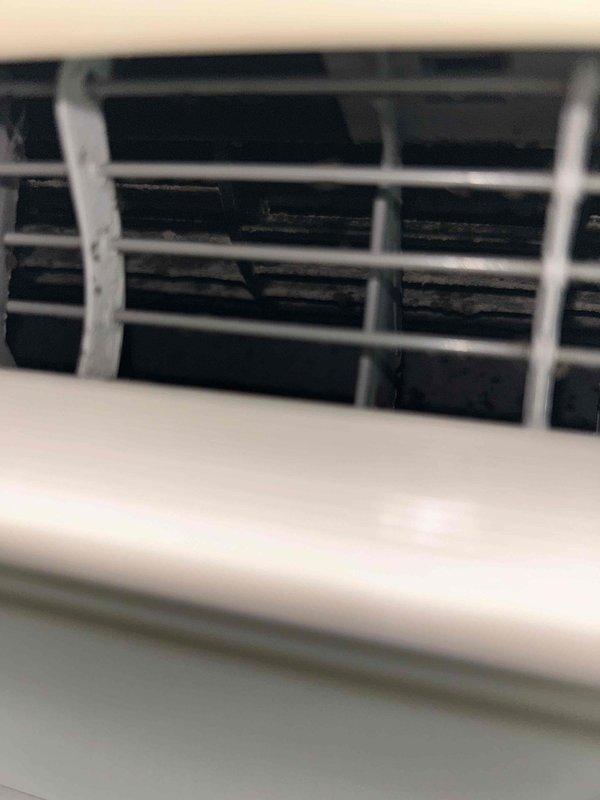 Responded to maintenance call for a Daikin mini split system with heavily soiled indoor unit and visible mold growth on air deflector flaps. Performed initial inspection revealing dirty filters and contamination deep within the evaporator coil assembly that was inaccessible to homeowner cleaning. Provided quote for complete indoor head unit deep cleaning service and obtained authorization, with return visit scheduled to perform thorough cleaning using specialized equipment including cleaning kit and pump sprayer.