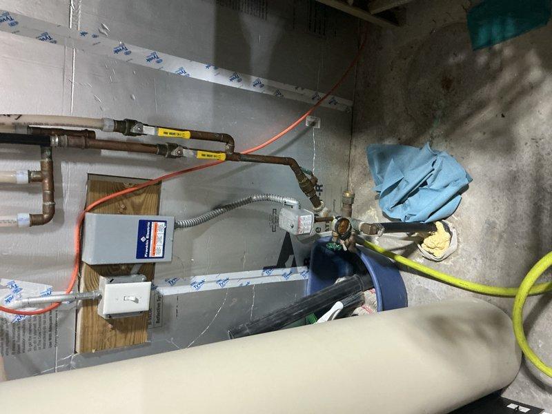 Responded to complaint of pressure tank making noise and low water pressure. Upon inspection, determined the pressure tank was short cycling due to a ruptured bladder. Replaced the defective pressure tank and tank tee to restore proper water pressure and eliminate the cycling issue. System tested and verified operational upon completion.