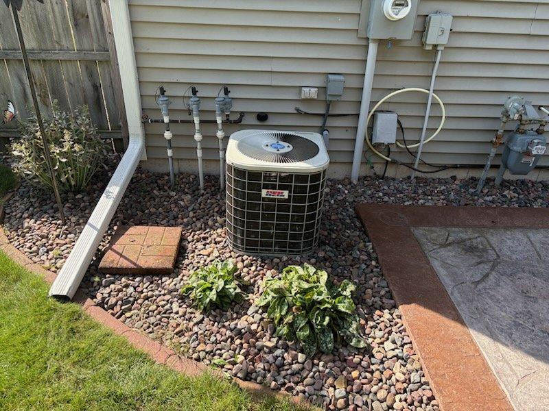 Responded to no cooling call on residential air conditioning system. Upon arrival, found compressor not starting. Tested capacitor and confirmed low readings, replaced with new capacitor. After replacement, unit still failed to produce cooling. Connected manifold gauges to system and discovered refrigerant charge was depleted. Due to age of unit and extent of repairs needed, coordinated with service advisor to schedule follow-up appointment for comprehensive system evaluation and refrigerant leak diagnosis.