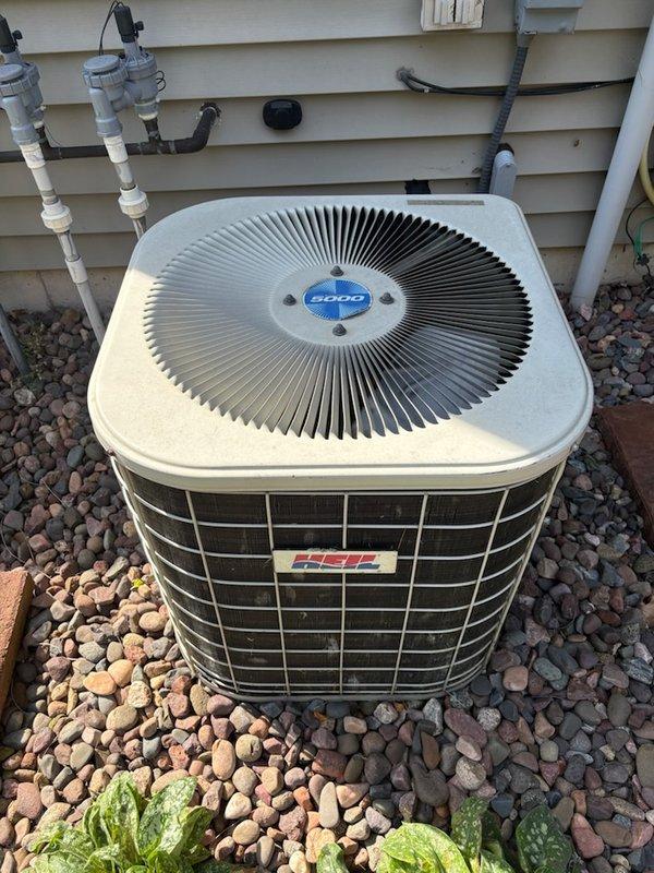 Responded to no cooling call on residential air conditioning system. Upon arrival, found compressor not starting. Tested capacitor and confirmed low readings, replaced with new capacitor. After replacement, unit still failed to produce cooling. Connected manifold gauges to system and discovered refrigerant charge was depleted. Due to age of unit and extent of repairs needed, coordinated with service advisor to schedule follow-up appointment for comprehensive system evaluation and refrigerant leak diagnosis.
