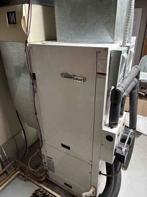 Responded to no cooling complaint on geothermal system. Found air filter collapsed against evaporator coil, causing restricted airflow and coil freezing. Replaced filter and diagnosed freezing issue as either faulty TXV or low refrigerant charge in R22 system. During inspection, identified failed in-floor heat pump circulator and leaking automatic air vent requiring attention. Due to age of equipment (20 years) and R22 refrigerant phase-out considerations, scheduled follow-up appointment to provide system replacement options.