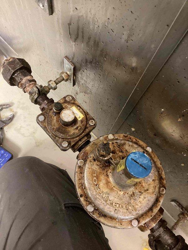 Responded to no-gas condition at commercial fryer. Upon inspection, determined the high-pressure regulator had failed and was not allowing gas flow to the equipment. Removed the corroded existing regulator and installed a new high-pressure gas regulator, restoring proper gas supply to the fryer and returning the unit to full operation.
