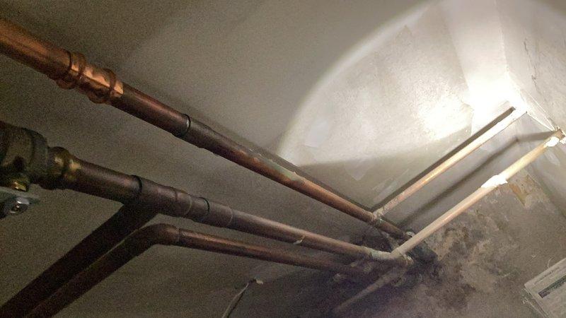 Responded to service call for leaky faucet in master bathroom. Assessed condition of existing fixture and provided estimate for complete sink and faucet replacement. Additionally diagnosed non-functioning kitchen sink sprayer and identified repair options. Documented existing plumbing infrastructure including water supply lines and mechanical equipment for future reference.