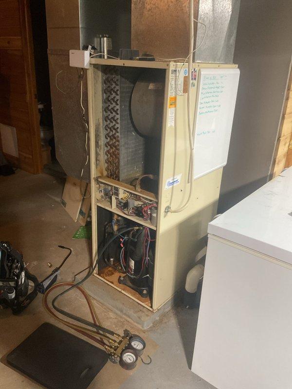 Responded to no cooling complaint on 1997 geothermal system. Upon arrival, found unit locking out on low pressure switch due to low R-22 refrigerant charge. Excavation work had been performed on property prior to system failure, noted as potential cause of refrigerant loss. Given the age of the equipment and cost considerations for R-22 refrigerant, recommended system replacement rather than repair. Customer agreed to have sales advisor evaluate replacement options.