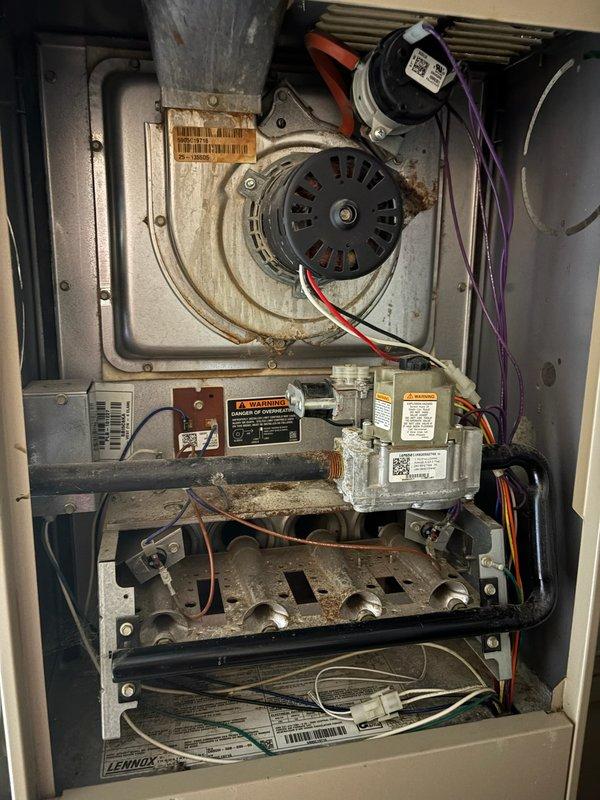 Responded to no cool call on 21-year-old Lennox air conditioning system. Diagnosed and replaced failed blower capacitor to restore furnace blower operation. During troubleshooting, discovered tripped AC breaker; upon reset attempt, right side of breaker disengaged from bus rail. Temporarily reseated breaker but noted excessive looseness requiring electrical panel correction for safety. Performed comprehensive system evaluation including heat exchanger inspection (observed wear and potential crack formation at eyelets), refrigerant charge verification (within specifications), AC electronics testing (operational), and temperature drop measurement (within acceptable range). All photographic documentation completed. Customer enrolled in rewards program and follow-up appointment scheduled with service advisor for equipment age concerns and electrical panel issue.