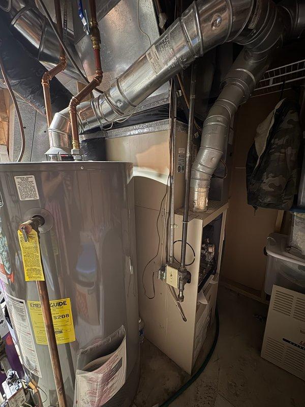 Responded to no cool call on 21-year-old Lennox air conditioning system. Diagnosed and replaced failed blower capacitor to restore furnace blower operation. During troubleshooting, discovered tripped AC breaker; upon reset attempt, right side of breaker disengaged from bus rail. Temporarily reseated breaker but noted excessive looseness requiring electrical panel correction for safety. Performed comprehensive system evaluation including heat exchanger inspection (observed wear and potential crack formation at eyelets), refrigerant charge verification (within specifications), AC electronics testing (operational), and temperature drop measurement (within acceptable range). All photographic documentation completed. Customer enrolled in rewards program and follow-up appointment scheduled with service advisor for equipment age concerns and electrical panel issue.