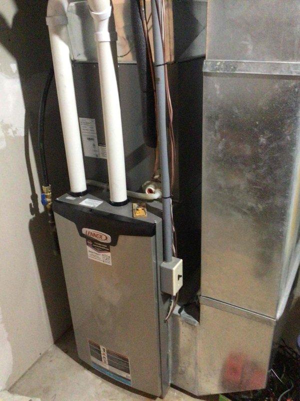 Completed comprehensive annual maintenance on residential split HVAC system consisting of outdoor condensing unit and Lennox furnace. Performed full tune-up procedures on both heating and cooling equipment per manufacturer specifications. Inspected all system components, verified proper operation of air conditioning unit and furnace, checked refrigerant lines and electrical connections, and confirmed both units are functioning within normal parameters. All maintenance tasks completed successfully with no deficiencies noted.