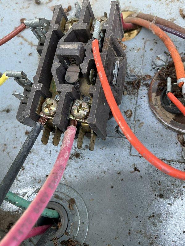 Completed comprehensive maintenance on 24-year-old R22 air conditioning system and furnace. Replaced failed dual capacitor and contactor, cleaned blower wheel, and replaced draft motor. Performed standard tune-up procedures on both heating and cooling systems, with multimeter testing confirming proper amperage draw of 0.49A on replaced components.