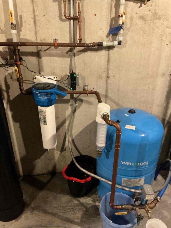 Replaced 2-inch spin-down sediment filter on whole home water treatment system to address low water pressure issues. Installed new shower cartridges to resolve leaking in shower valve assembly. Repaired dripping bathtub faucet to eliminate water waste and restore proper operation.