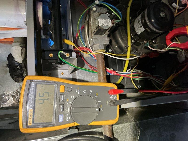 Completed comprehensive furnace tuneup and inspection on a 2017 Heil 90% efficiency unit at a rental property. Performed thorough maintenance including scrubbing the flame sensor and burners to ensure optimal combustion. Conducted detailed inspection of all critical components including blower motor, inducer motor, control board, and capacitor—all found to be in good working condition. Thoroughly examined heat exchanger for cracks or deterioration with no defects found. Tested and verified CO levels at 6 ppm and gas pressure at 3.20 w.c., both within acceptable operating parameters. System tested successfully and passed all inspection criteria, operating properly with no issues identified.