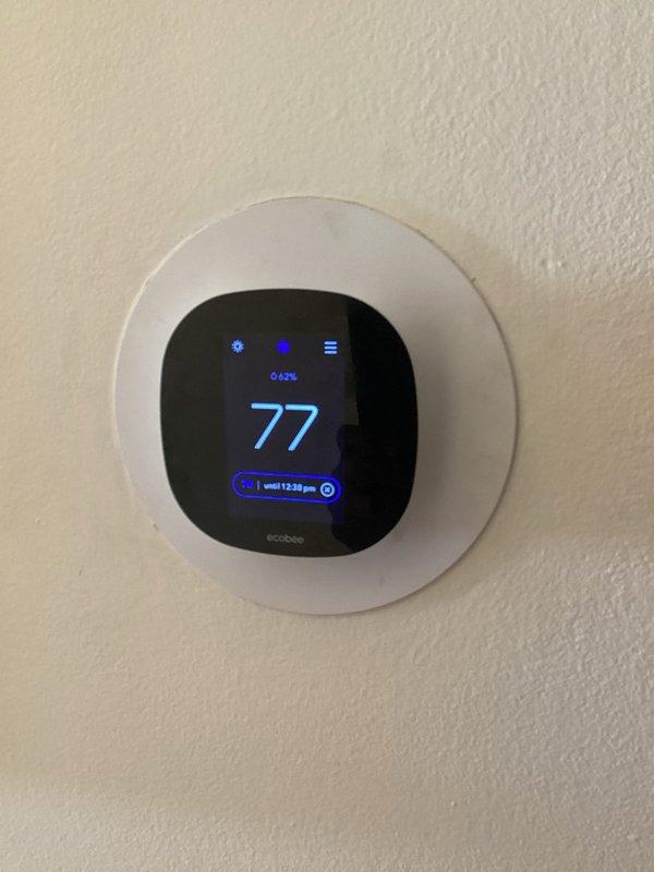Responded to no cooling complaint on system with previous service history. Found control board receiving 26 volts but failing to energize system. Removed and reseated fuse, which restored system operation temporarily. Diagnosed intermittent control board failure causing loss of communication with thermostat. Verified five-wire thermostat configuration at ecobee smart thermostat with proper terminal connections (R, C, G, Y, W). System currently operational but control board requires replacement due to intermittent failure pattern. Provided quotes for control board replacement and complete system replacement given unit age.