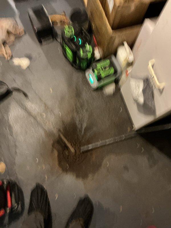 Responded to mainline sewer backup affecting basement floor drain and shower, with water flooding present on basement floor. Diagnostic camera inspection revealed combined toilet paper and tree root blockage at approximately 40 feet in the main line. Cabled the drain line to remove all visible tree roots and debris from the blockage point. Performed complete camera inspection of line to 130 feet to verify clearance and identify any additional issues. Inspection revealed pipe bellies at 26-40 feet and 90-96 feet that may require future monitoring. Conducted 15-minute water flow test from each affected drain fixture to confirm proper drainage and verify complete restoration of system function.